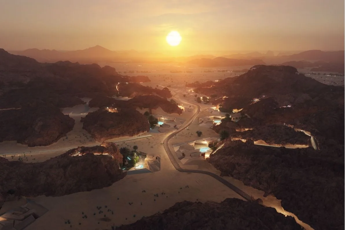 Aerial view of a desert development at sunset